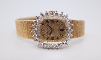 Stunning Rolex Ladies 14K Solid Gold Dress Watch with Diamond Bezel Ref 8286