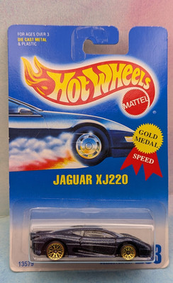 1995 Hot Wheels JAGUAR XJ220 #203  dark blue;gold lace  Gold Medal