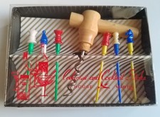 A 1960s bar set with corkscrew and cocktail sticks