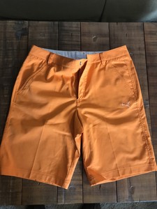 puma orange golf shorts