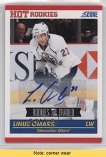 2010-11 Score Rookies & Traded Signatures Linus Omark #607 Auto READ n8a