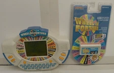 Wheel Of Fortune 1998 Electronic Handheld Game +2 Cartridges 1 is NOS - TESTED