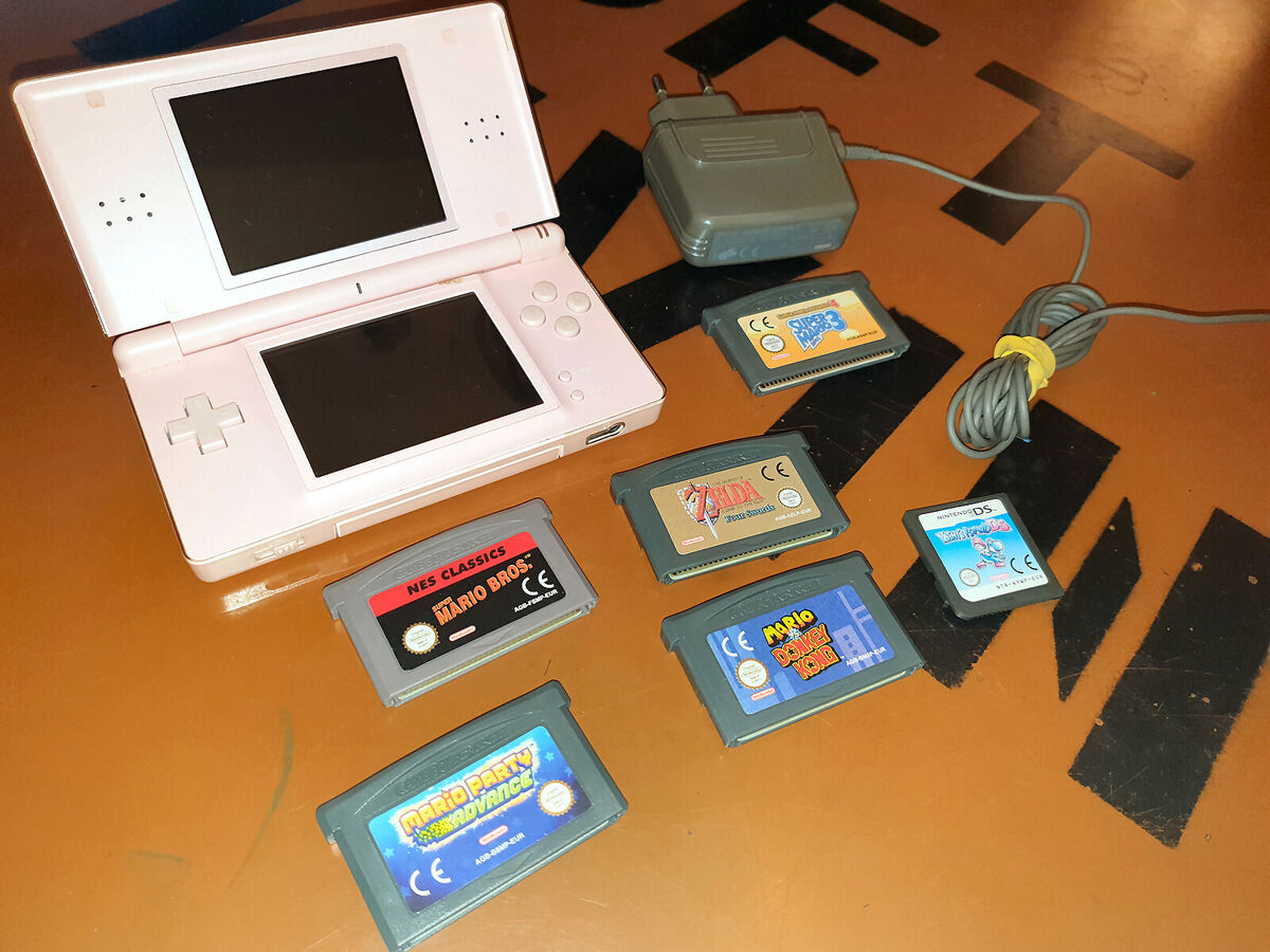 Nintendo DS Lite Console Pink with Super Mario and Legend of Nintendo DS Lite Console Pink with Super Mario and Legend of