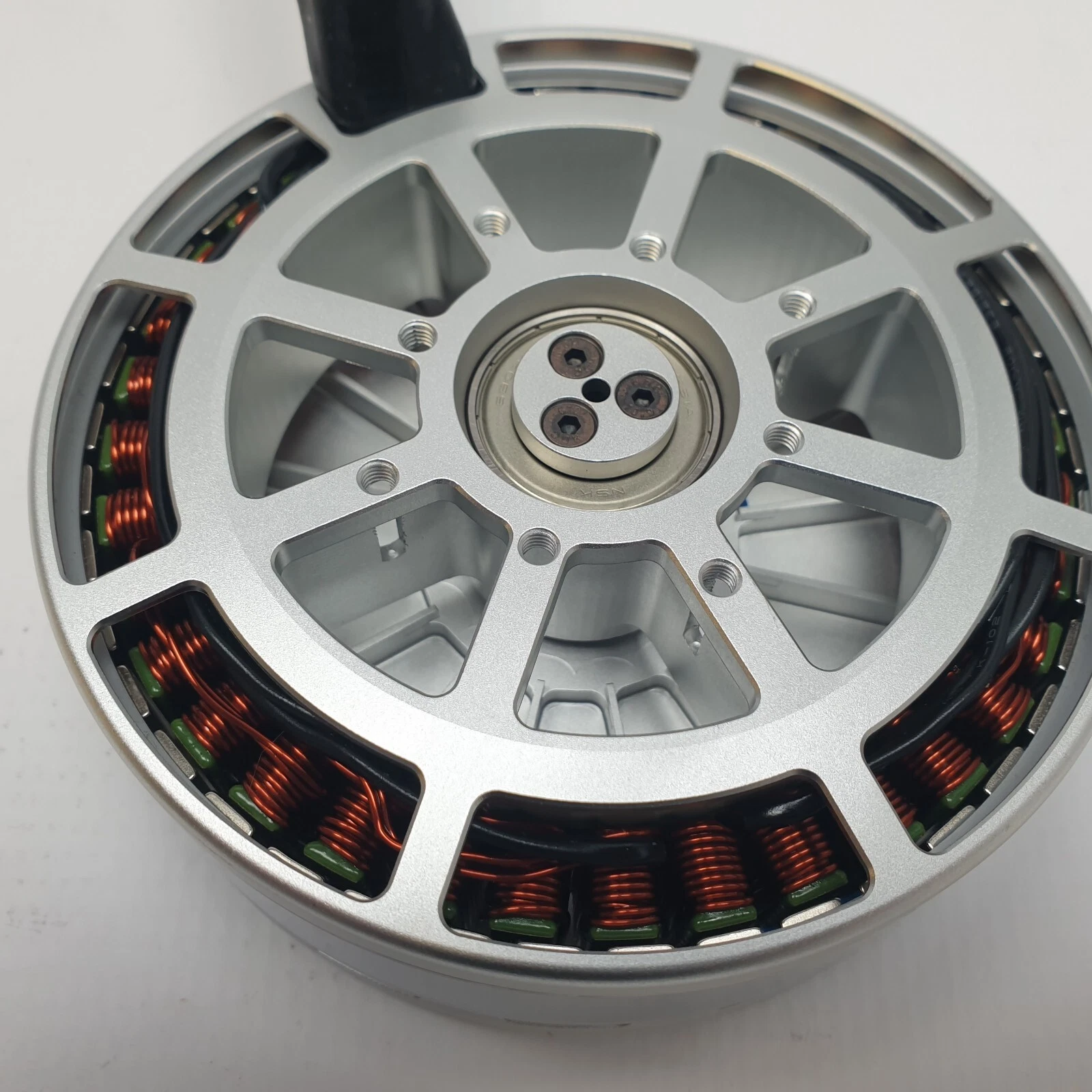 Base of the P150 motor with stator windings and 3-screw bearing retainer