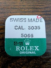 ROLEX-SPRING CLIP -FACTORY SEALED- CALIBER 3035 PART 5066 0.135mm
