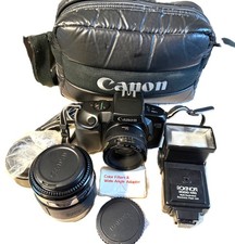 Canon EOS 750 SLR Camera w/ 50mm Len 70 to 210mm Len Rokinon Flash3000 Bag Acc