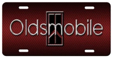 OLDSMOBILE  Inspired Art on Red simulated carbon fiber Aluminum License Plate