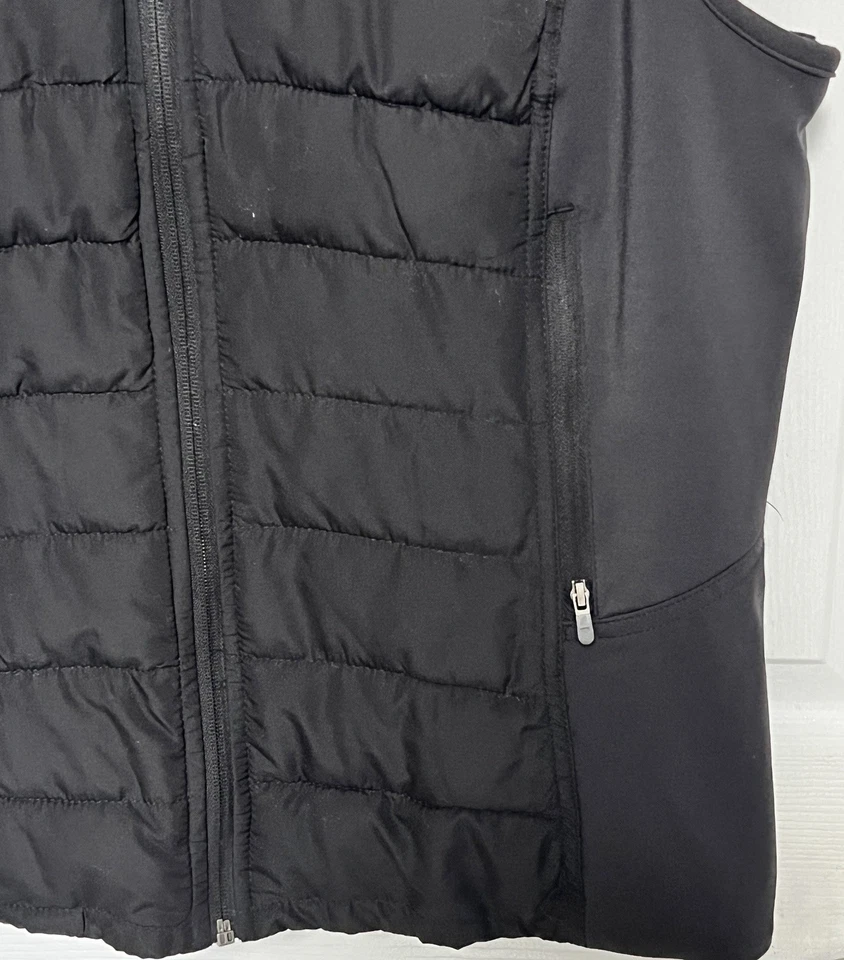 Chaleco acolchado con cremallera Tangerine para mujer con capucha y paneles elásticos negro mediano Foto 4 de 4