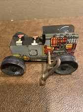 Vintage mechanical tin toy Wind Up Working With Original key and tires. no top
