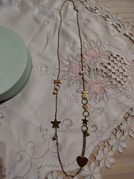 Collar largo de plata dorada de Tous