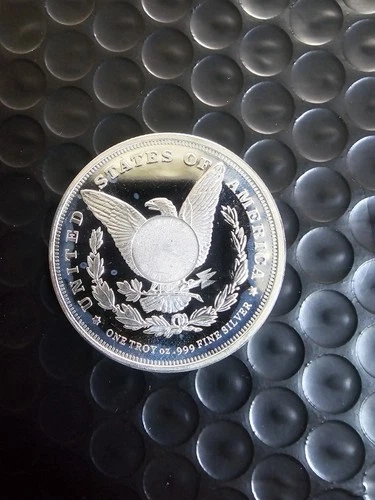 1 Troy Ounce .999 Fine Silver Morgan Design Round.