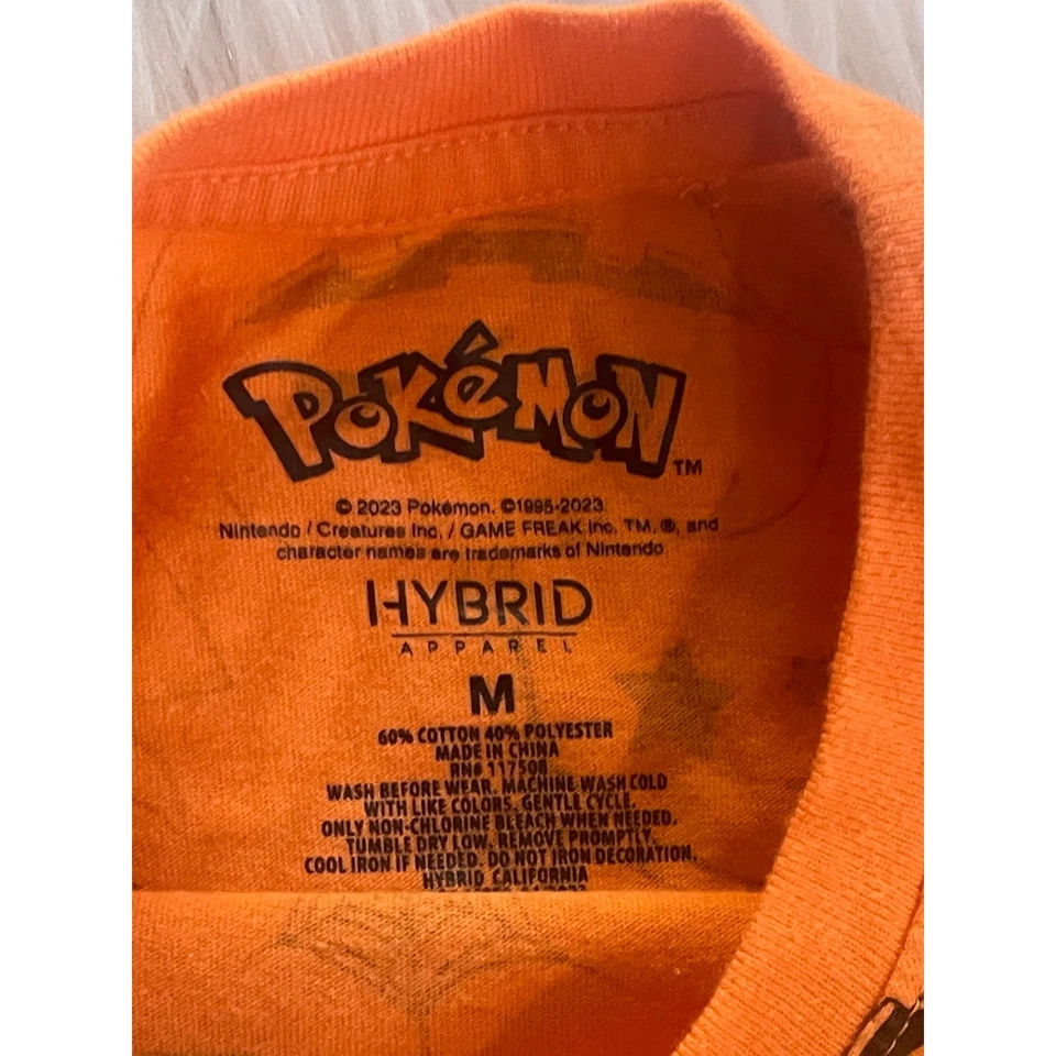 Camiseta de manga corta de Halloween naranja calabaza Pokemon Pikachu para niños talla M usada Foto 3 de 4