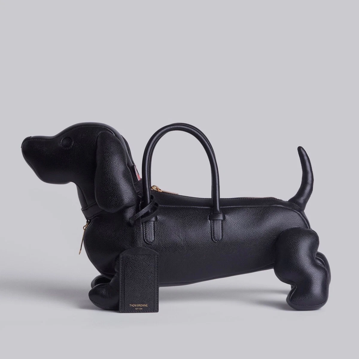 Thom Browne Hector Dog-Shaped Pebbled Leather Bag  Black duffle bag,  Leather duffle bag, Mens leather bag