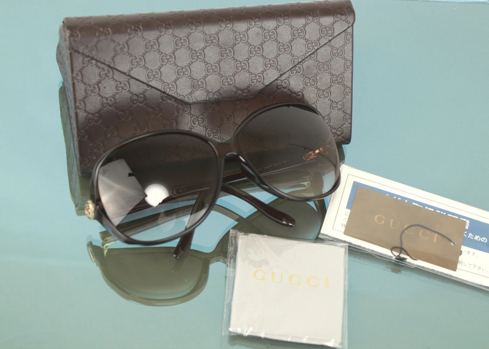 Lunettes de soleil marron logo Gucci GG accessoires lunettes avec étui bonne Italie pour femmes