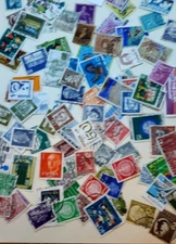 Over 200 World Wide stamps stock photo.