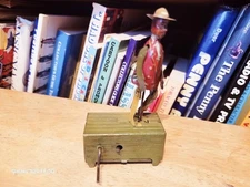 VINTAGE 1910's  DISTLER TIN LITHO WIND UP DANCER ON PLATFORM PENNY TOY