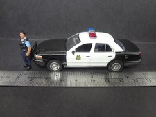 Greenlight 1998 Ford Crown Victoria w/ RANDOMLY selected police w/ blue uniform
