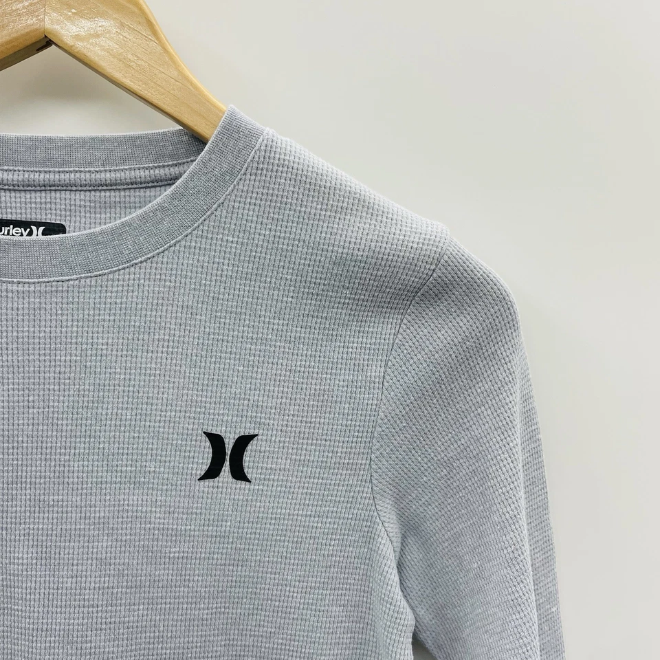 Camiseta Hurley Jóvenes Niños Talla 10/12 Térmica Cuello Redondo Manga Larga en Gris 904 Foto 2 de 4