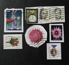 Lot de 8 timbres des USA années diverses - encore sur fragment - K35