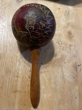 vintage, hand-carved wooden maraca originating from Puerto Rico