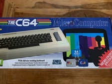 The C64 Maxi barely used includes USB rim with 100s of classic C64 games 