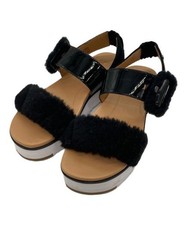 UGG                    Le Fluff Sandals black...
