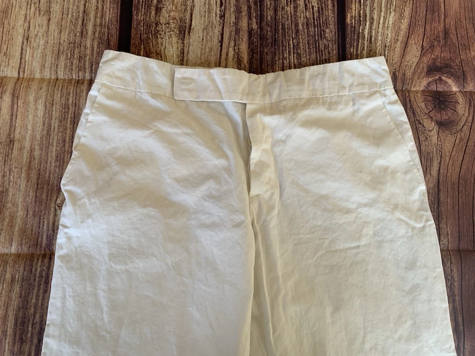 Pantalones de vestir marfil marfil con bolsillos laterales acampanados delanteros planos talla: 44 Foto 3 de 4