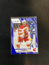 2023-24 O-Pee-Chee Hockey OPC Blue Border Parallel Elias Lindholm #25 Flames