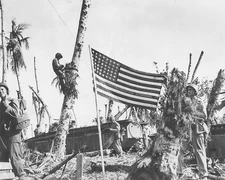 American Flag flies over Guam beachhead World War II WWII WW2 8x10 Photo 764c