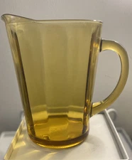 Vintage amber ribbed water beer pitcher 8" tall