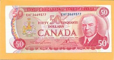 1975 CANADIAN 50 DOLLAR BILL EHF2669577 (CIRCULATED REAL SMALL TARE THE RIGHT  )