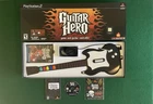 New ListingPS2 Guitar Hero Bundle w/ Guitar & strap, Stickers, Disc, & Manual - TESTED