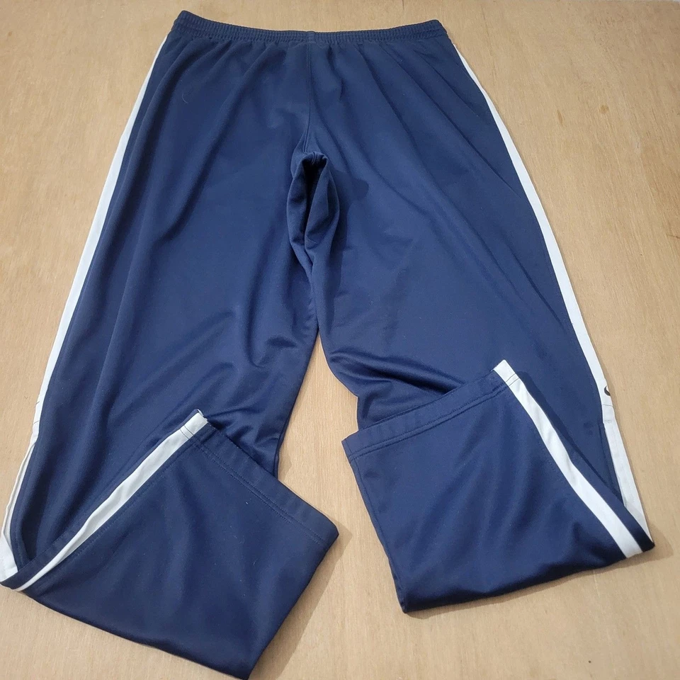 Pantalones deportivos Nike azules talla XL para hombre etiqueta plateada logotipo Swoosh cremallera inferior defecto🚨 Foto 4 de 4