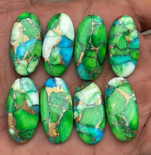 Showcasing Rich Tones of Blue Green Peacock Dahlia Turquoise Oval Loose Gemstone