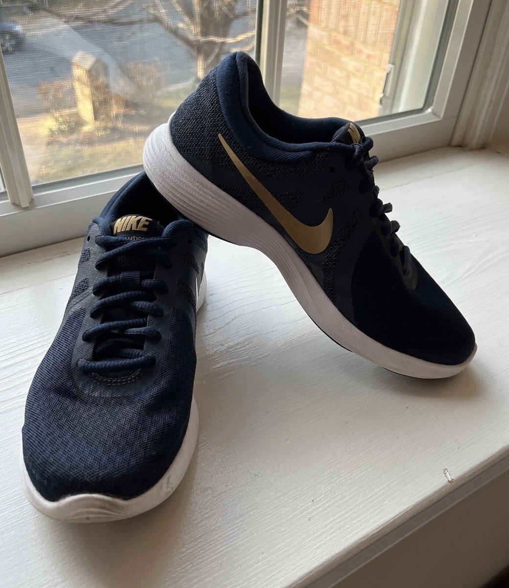 tubería Arturo Orador Nike Womens Revolution 4 Blue w/ Gold Stripe Running Shoes Sneakers Size  6.5 | eBay