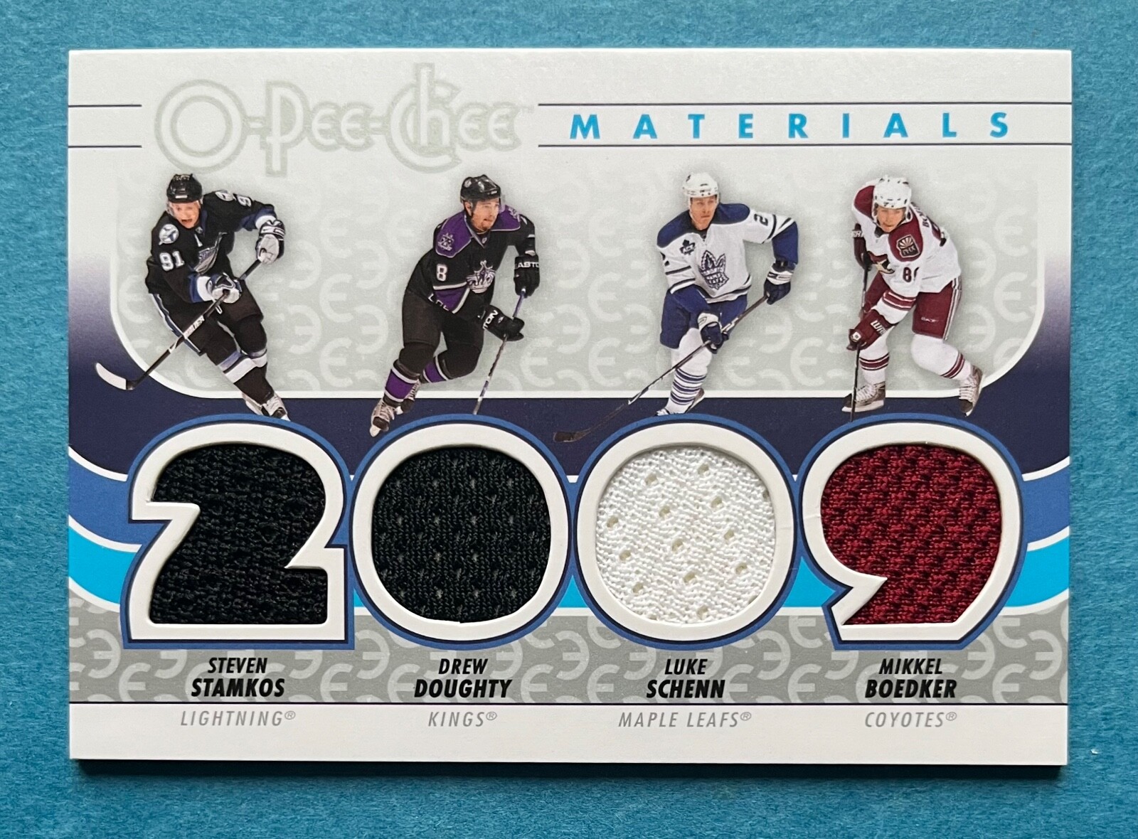 STEVEN STAMKOS DREW DOUGHTY SCHENN BOEDKER 2009-10 OPC MATERIALS QUAD JERSEY