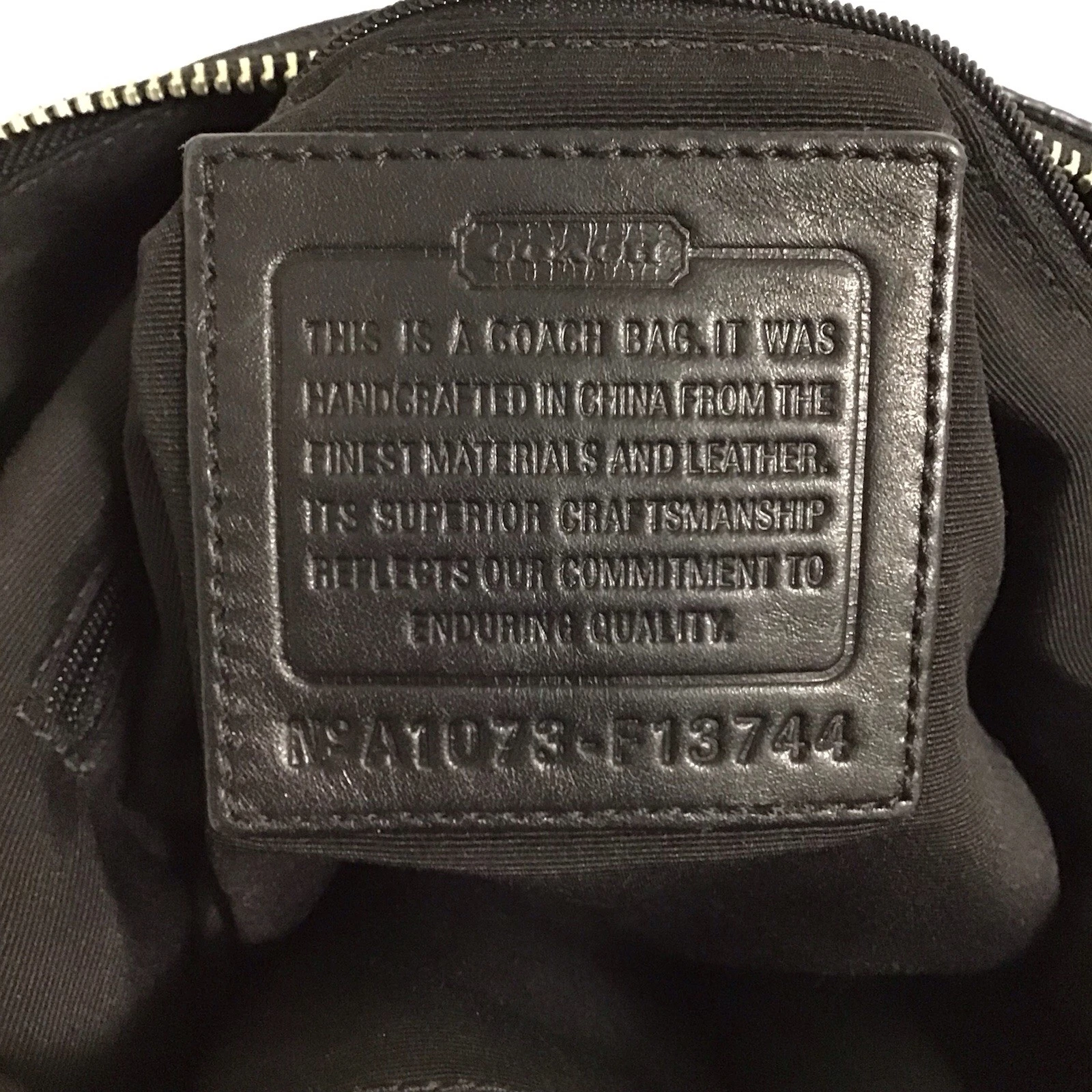 Borsa a tracolla Coach nera tela bordo pelle con polso omaggio usata in ottime condizioni