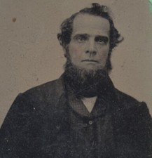 PORTRAIT OF MAN W/ EXPRESSIVE EYES AND RED TINTED CHEEKS