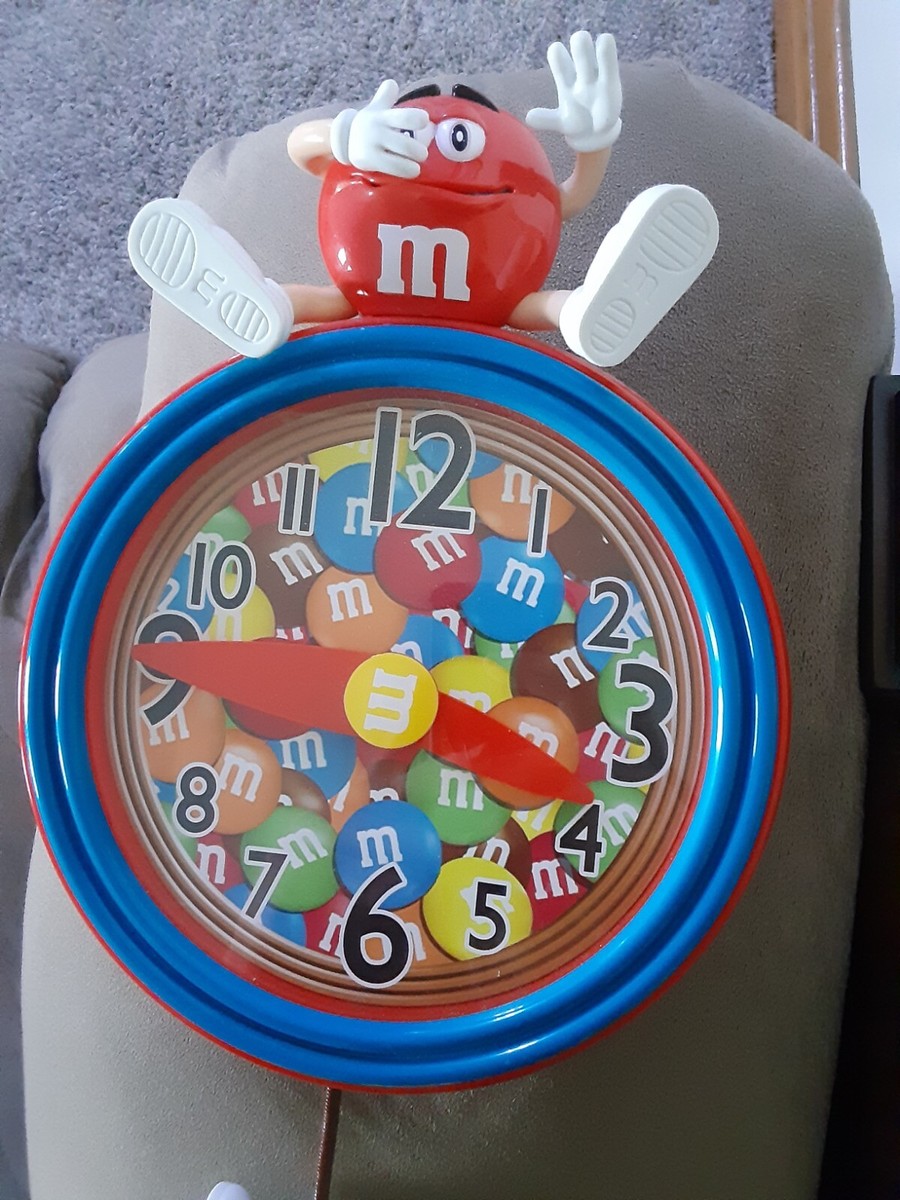 M&M's（エムアンドエムズ）MINI CLOCK M&M Whimsical Sounds Pendulum Yellow M&M Wall Clock Red Yellow