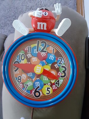M&M Whimsical Sounds Pendulum Yellow M&M Wall Clock Red Yellow