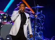 Ronnie DeVoe of New Edition performs at Joe Louis Arena during the- Old Photo