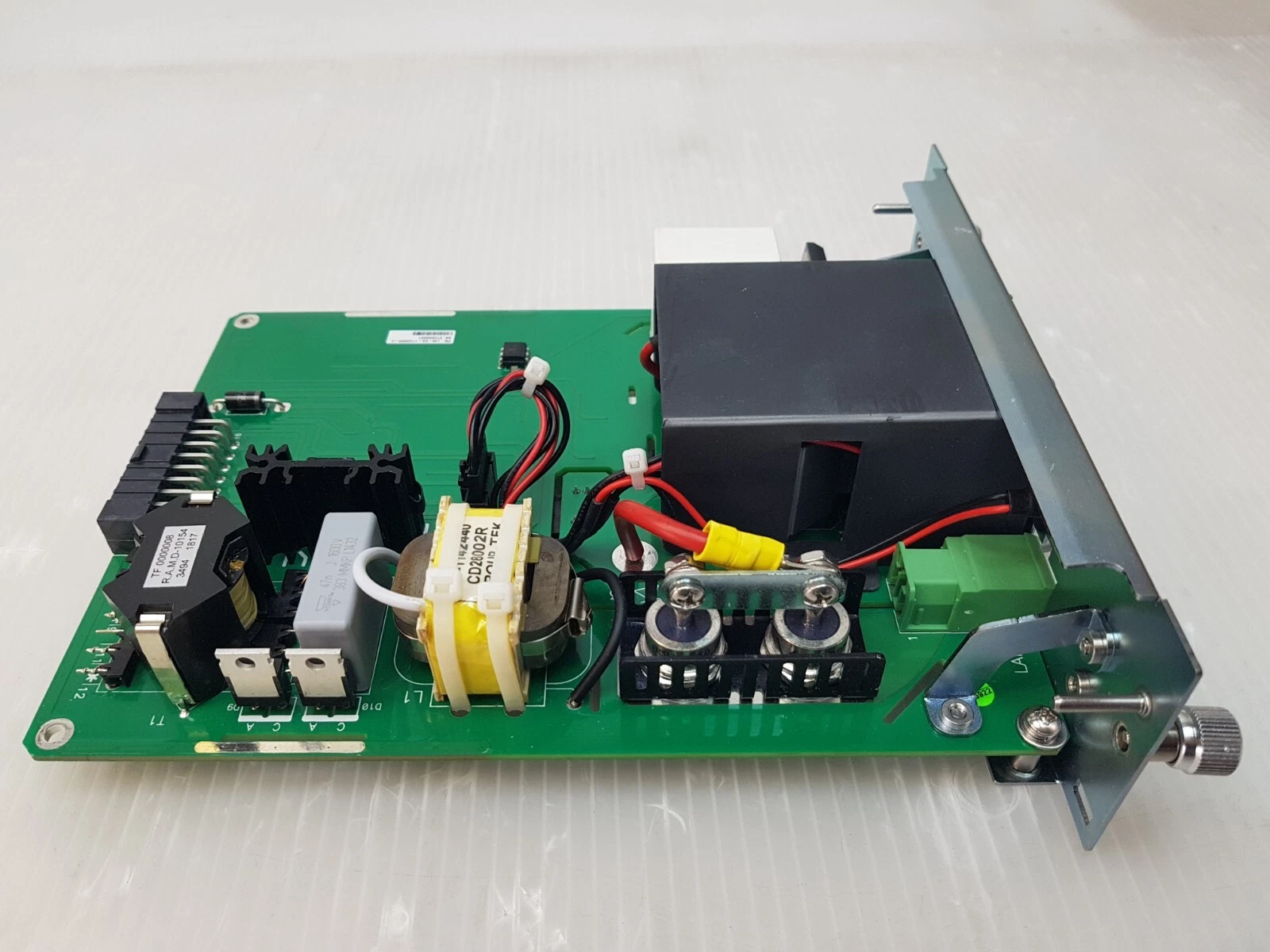 Side view of the LM-EA-1143863-C module with heat-sinked devices and high-current terminals