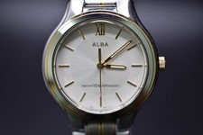 SEIKO ALBA V501-0DY0 Unisex Round Silver and Gold Mens Watch Vintage White Dial