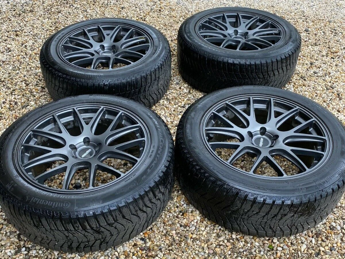 Four used winter tires mounted on Audi Q7 wheels 