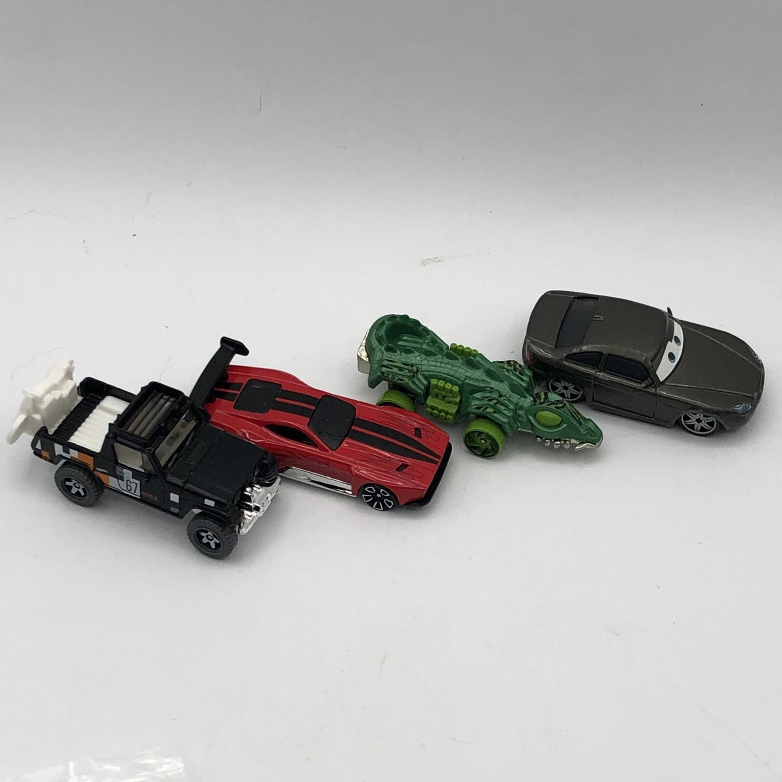 mattel quatro carros usados hot wheels disney pixar 