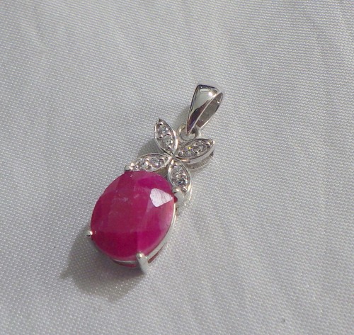 Sterling pendant w, natural faceted ruby & cz stones MINT CONDITION