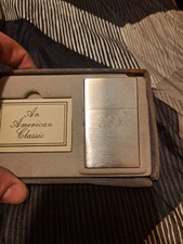 1932 replica zippo lighter among other collectable vintage zippos