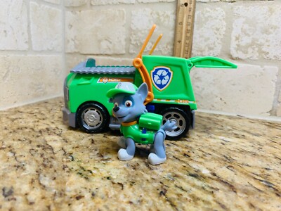 Spin Master Paw Patrol figure with green Rocky's Ultimate Rescue Recycle  Truck