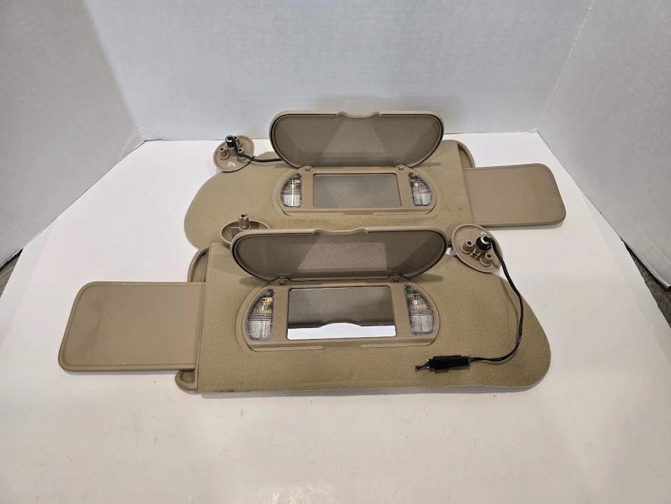 Par de parasoles izquierdo derecho Buick Lesabre 2000-2005 bronceado iluminado OEM A102 Foto 2 de 4