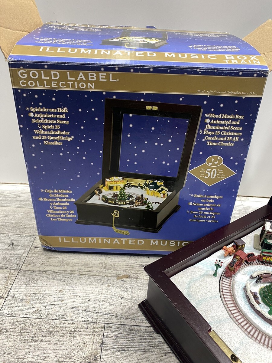 Mr. Christmas Gold Label Illuminated Music Box Train Plays Mr. Christmas Gold Label Illuminated Music Box Train Plays